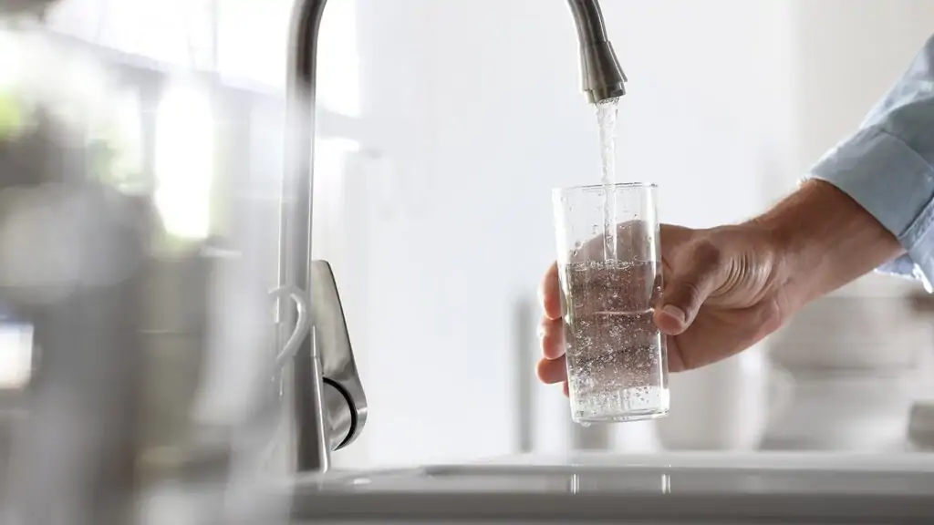 Water pouring into facet
